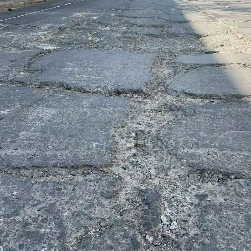 麻城路面起砂露石子修补料